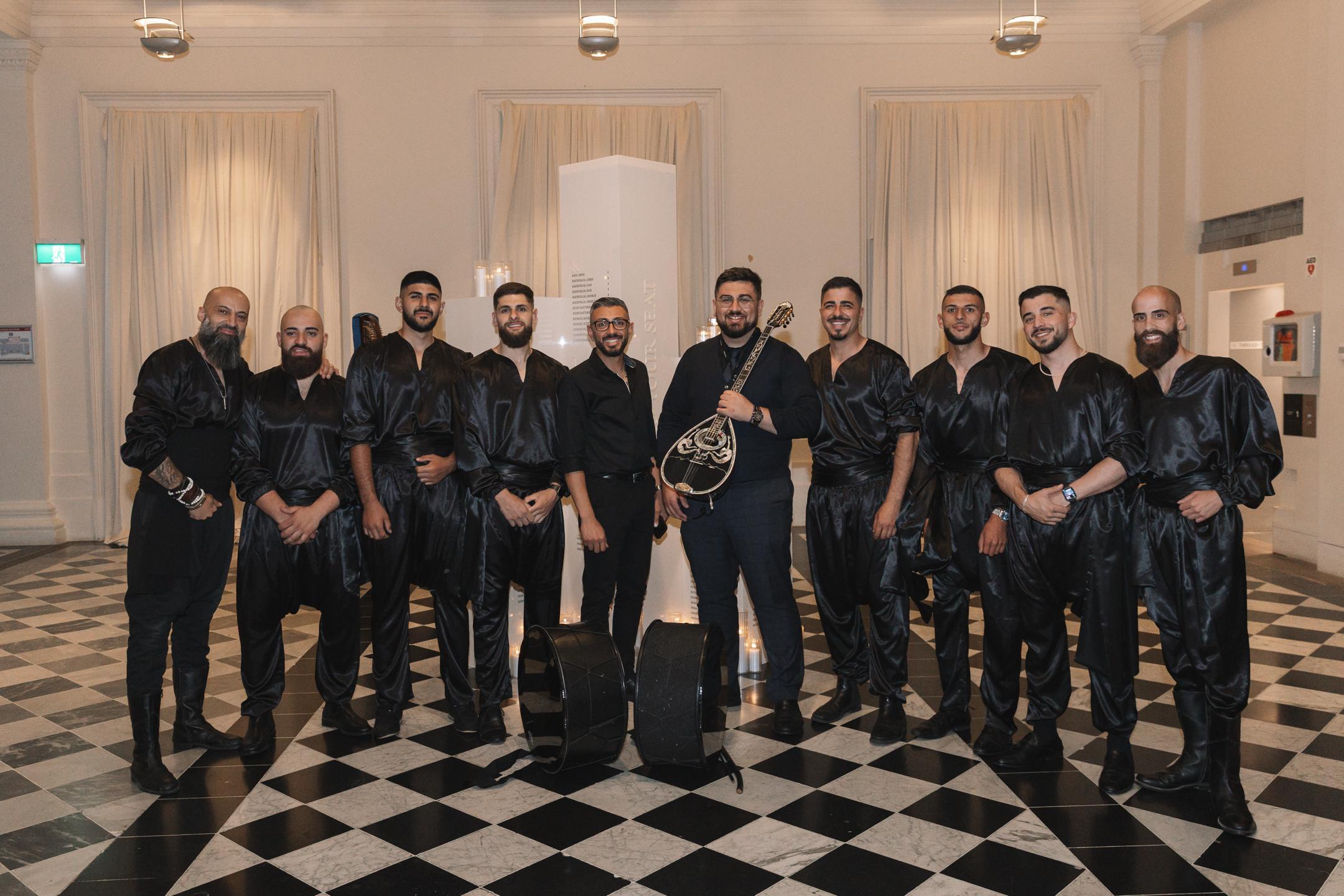 IAMNSA team in black performance costumes
