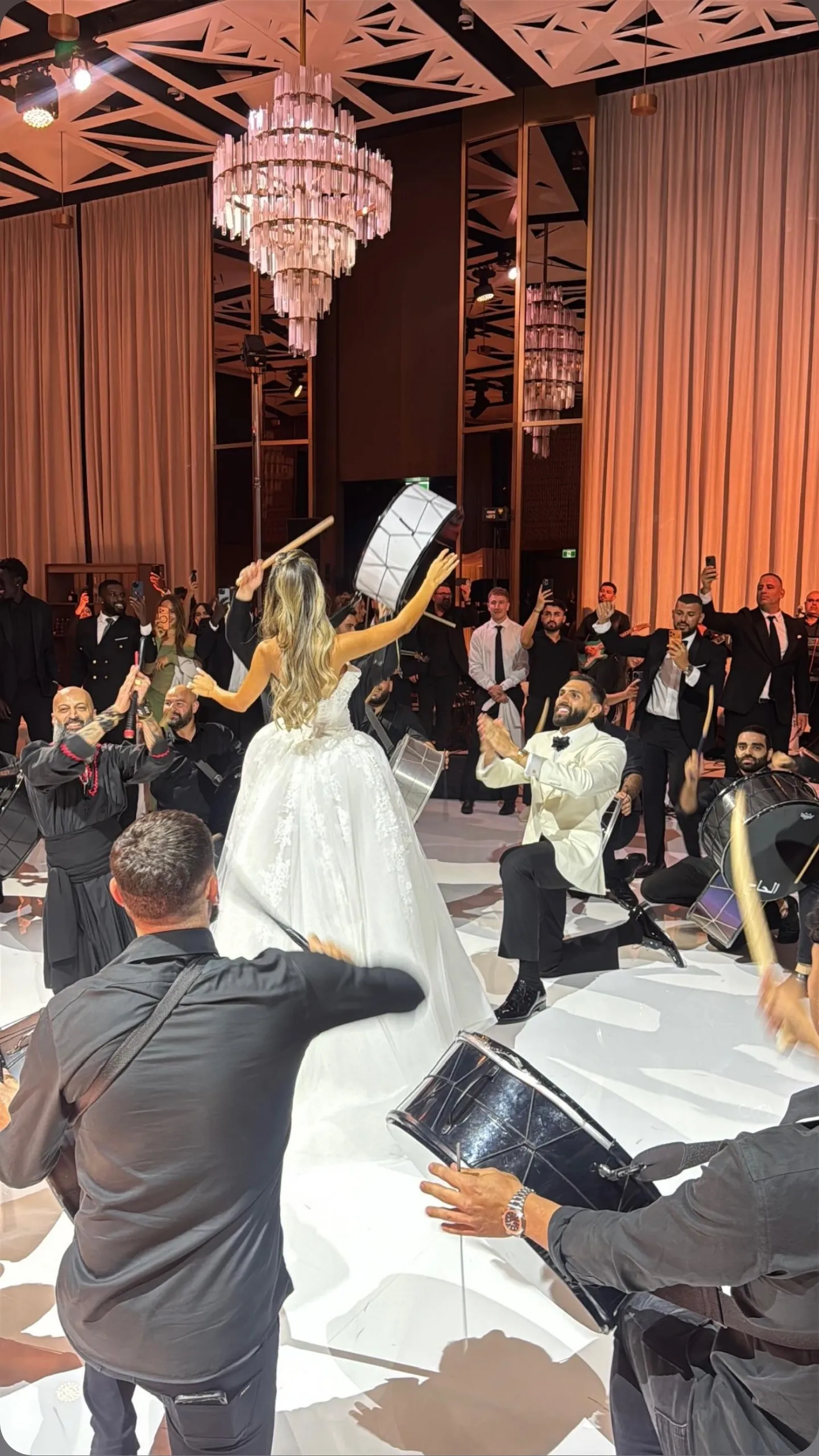 Bride raised above the wedding dance floor
