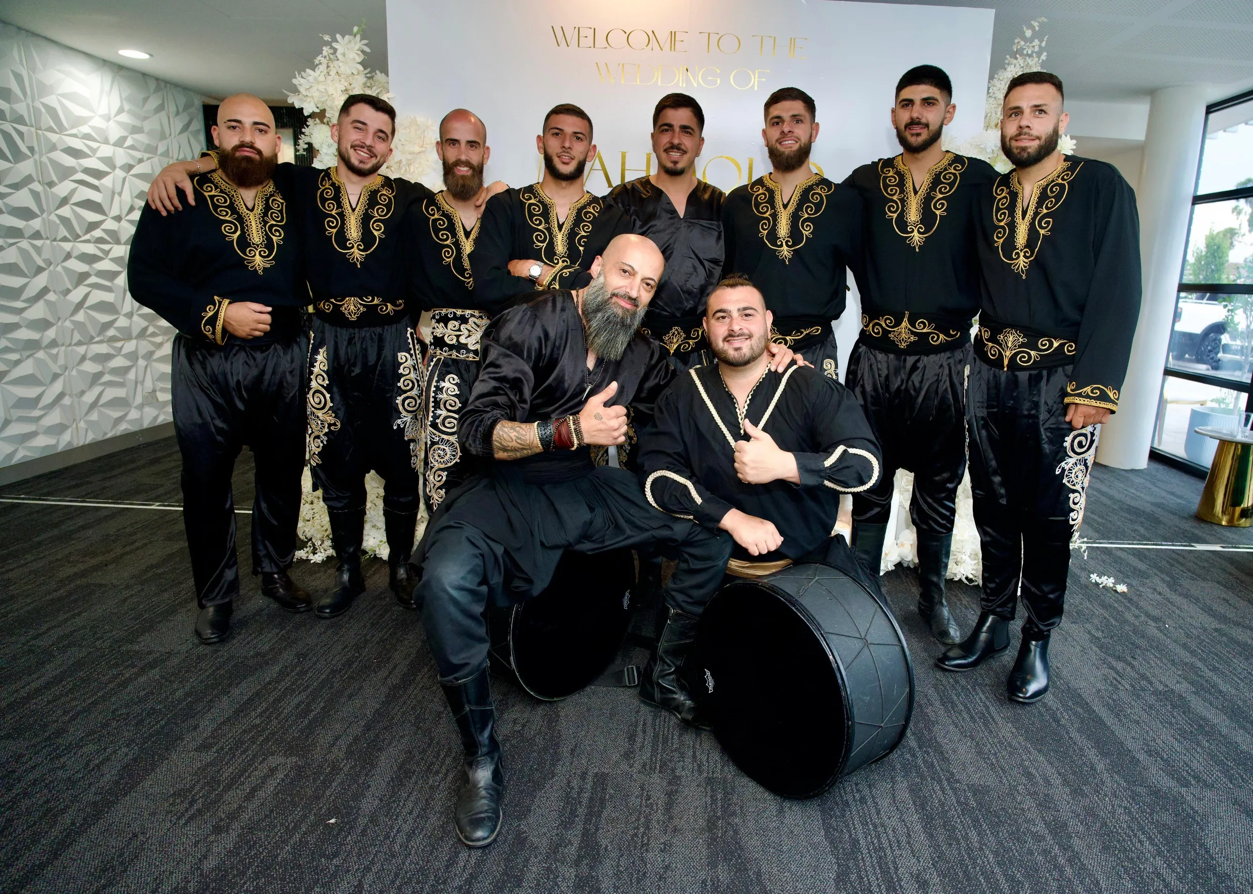 IAMNSA team in black and gold performance costumes